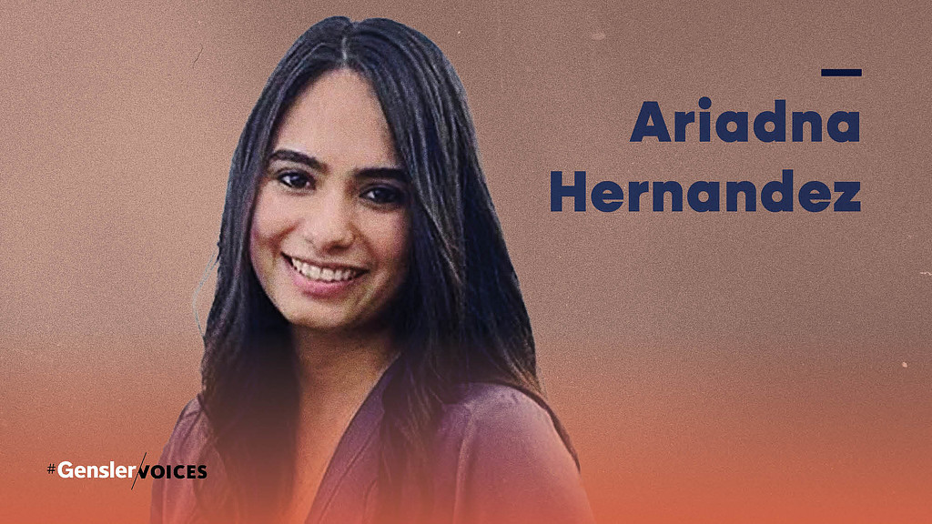 A woman smiling for the camera.